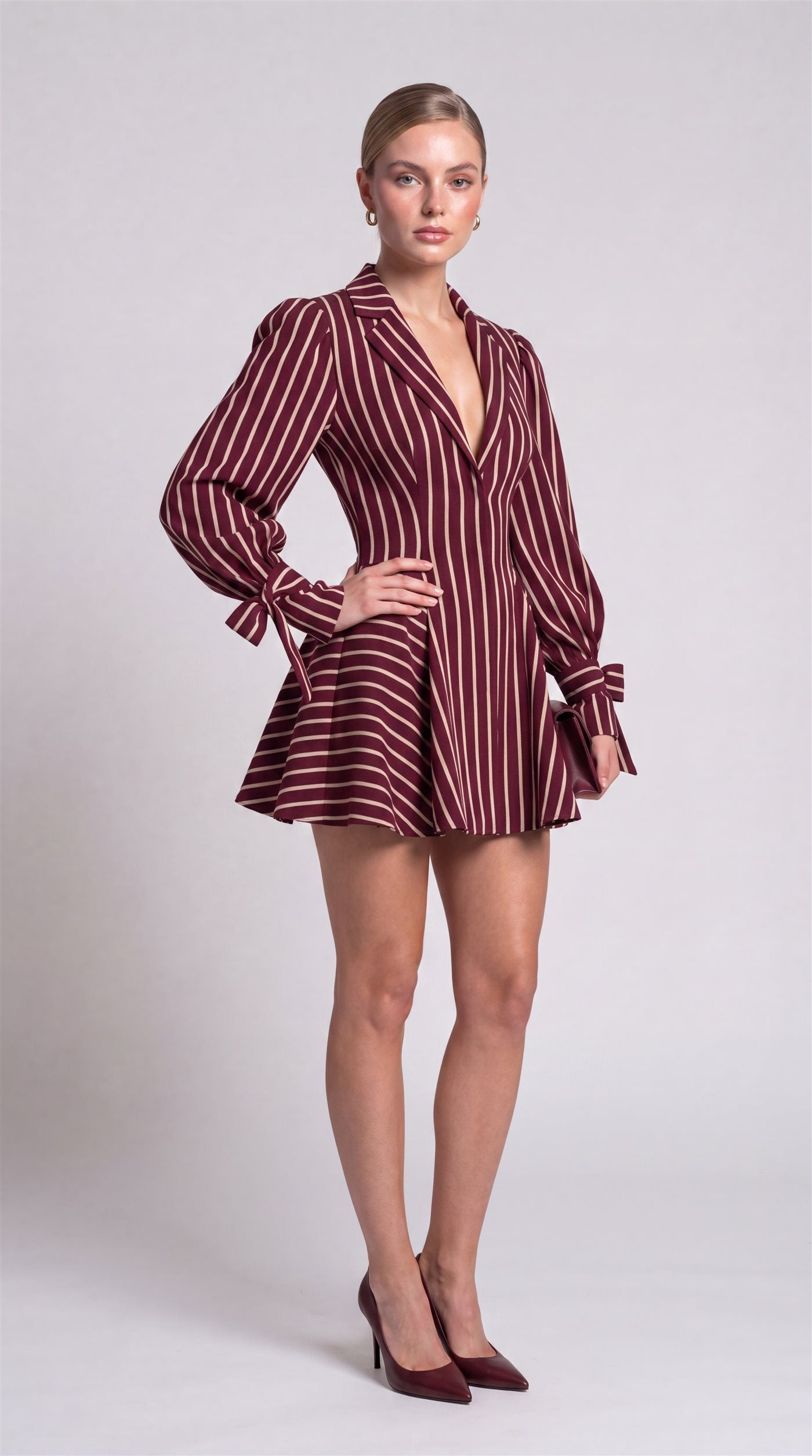 Zarrelah campaign — striped bow dress, three-quarter view