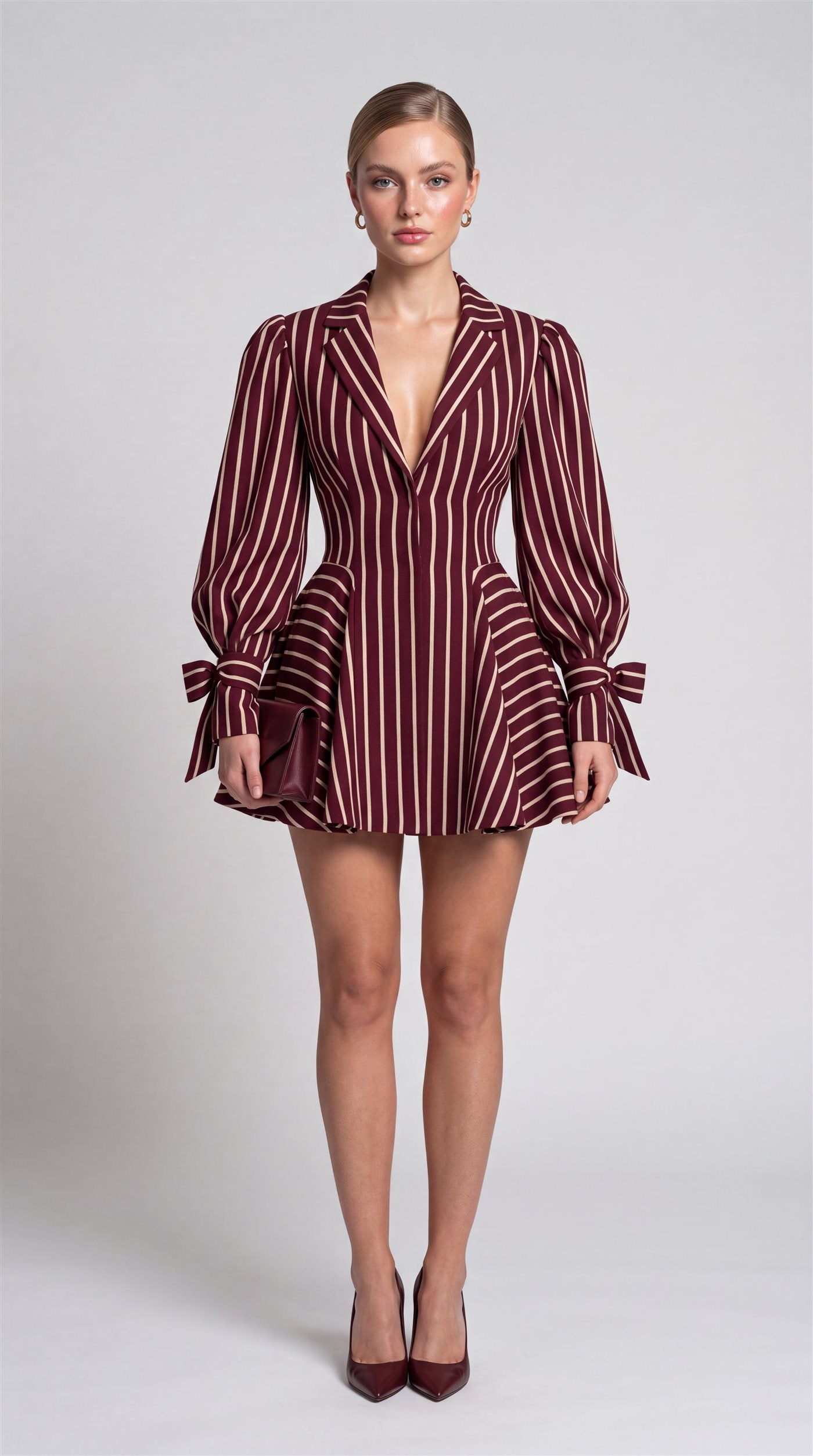 The Striped Bow Dress in burgundy and cream, front view