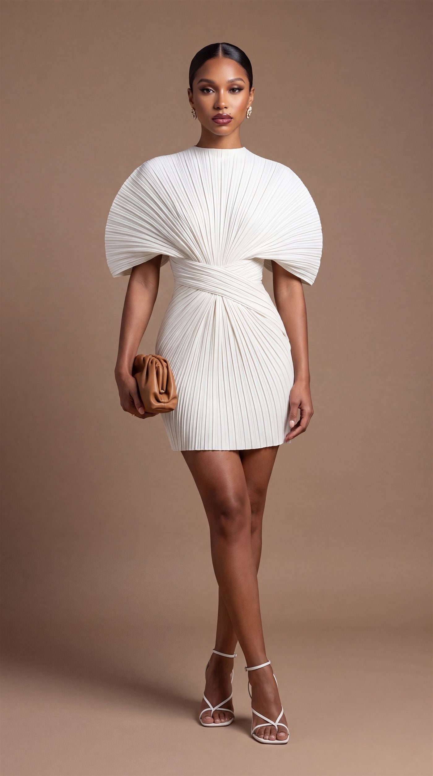 The Sculpted Pleat Dress in ivory, front view